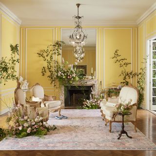 Yellow living room with ruggable antique rug