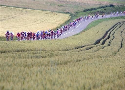 The peloton rolls through the countryside enjoying stunning views.