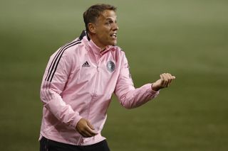 Phil Neville gives instructions to his Inter Miami players during a match against Philadelphia Union in April 2021.