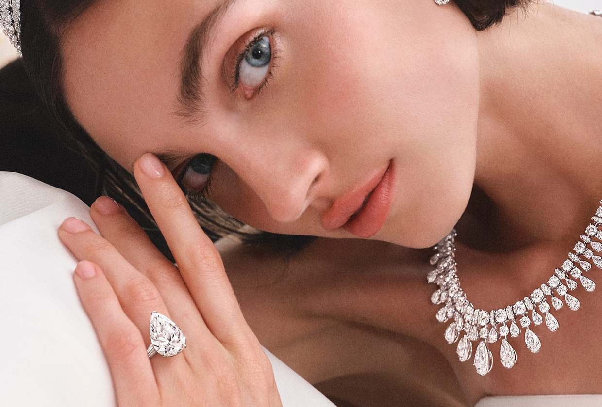 Woman wearing Graff luxury engagement ring.