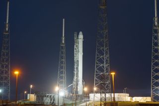 A SpaceX Falcon 9 rocket stands poised to launch a Dragon cargo ship to the International Space Station from Cape Canaveral Air Force Station in Florida on Jan. 10, 2014. It is the fifth SpaceX delivery mission for NASA.