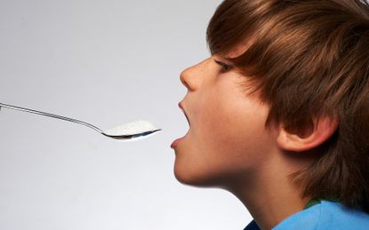 Child-eating-sugar-whats daily sugar allowance for children