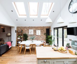 open plan kitchen extension with pitched roof and skylights
