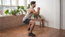 Man doing bodyweight squats