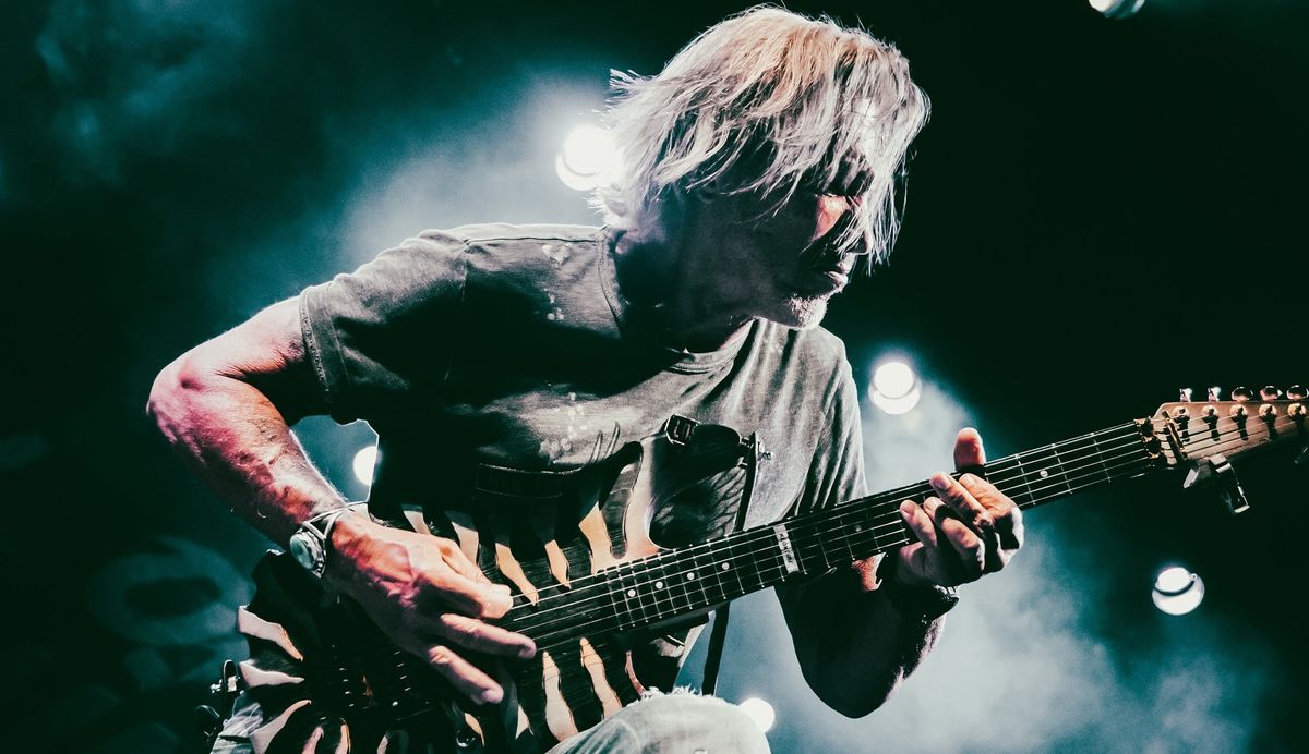 George Lynch performs onstage