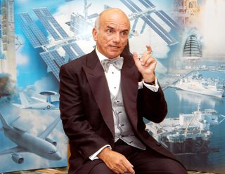 Dennis Tito became the first space tourist when he launched toward the International Space Station in April 2001. Here, he shares his experiences at a space conference in 2003.