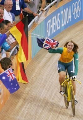 Anna Meares doing her victory lap after winning the 500m Time Trial im Athens