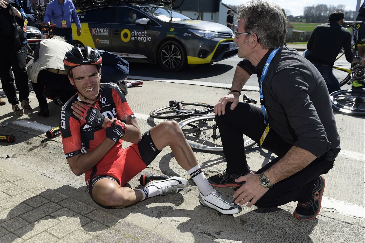 Greg Van Avermaet (BMC) sits on the ground after his crash