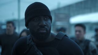 A man reacting to something shocking off screen