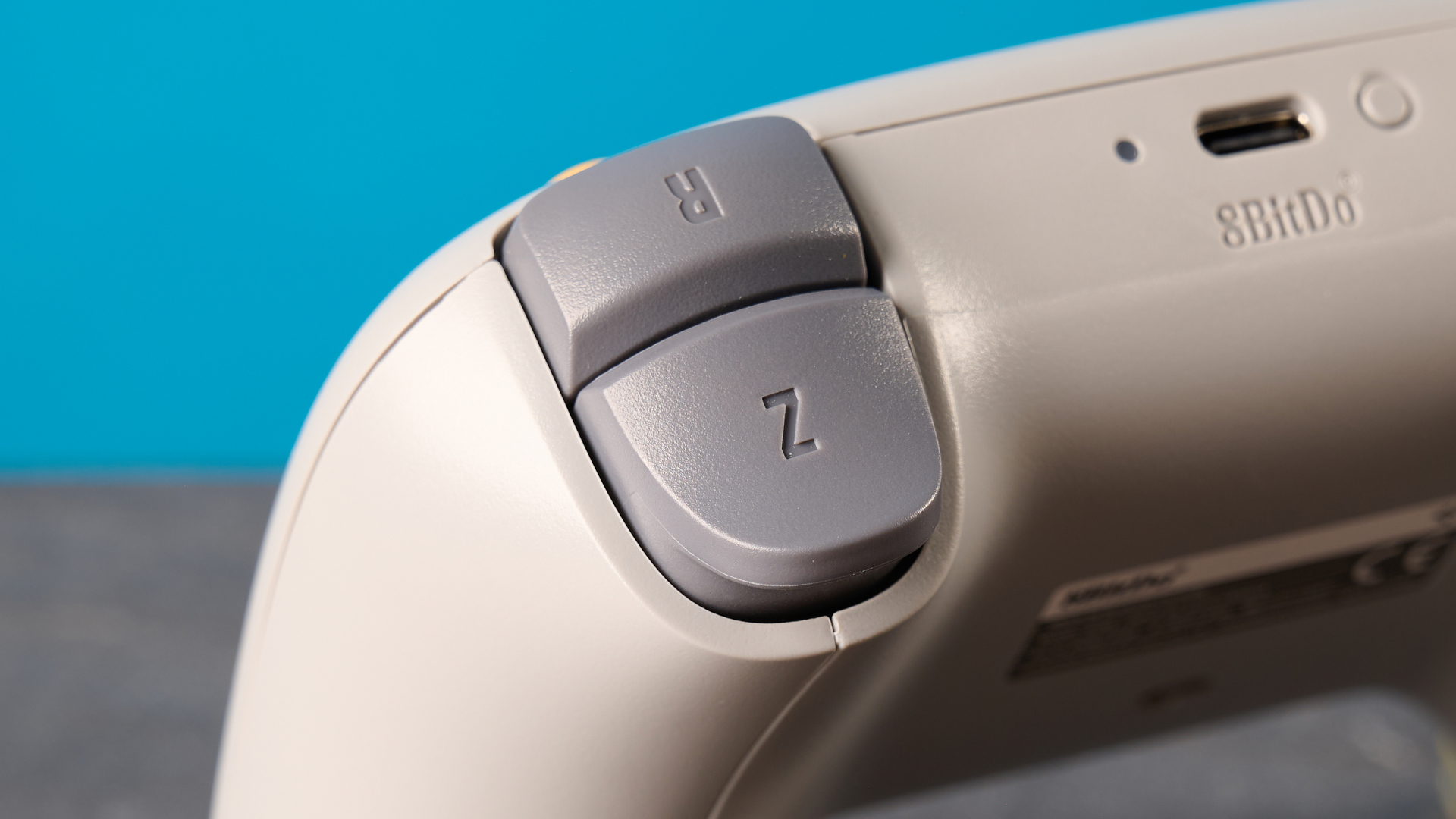 The 8BitDo 64 Controller against a blue background