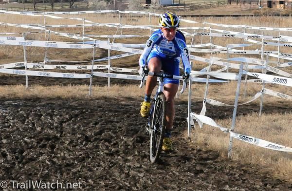 Katerina Nash (Luna Pro Team) emerging from a sea of course tape.
