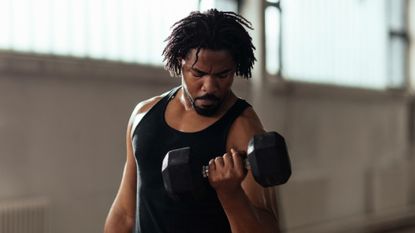 Man working out with dumbbells