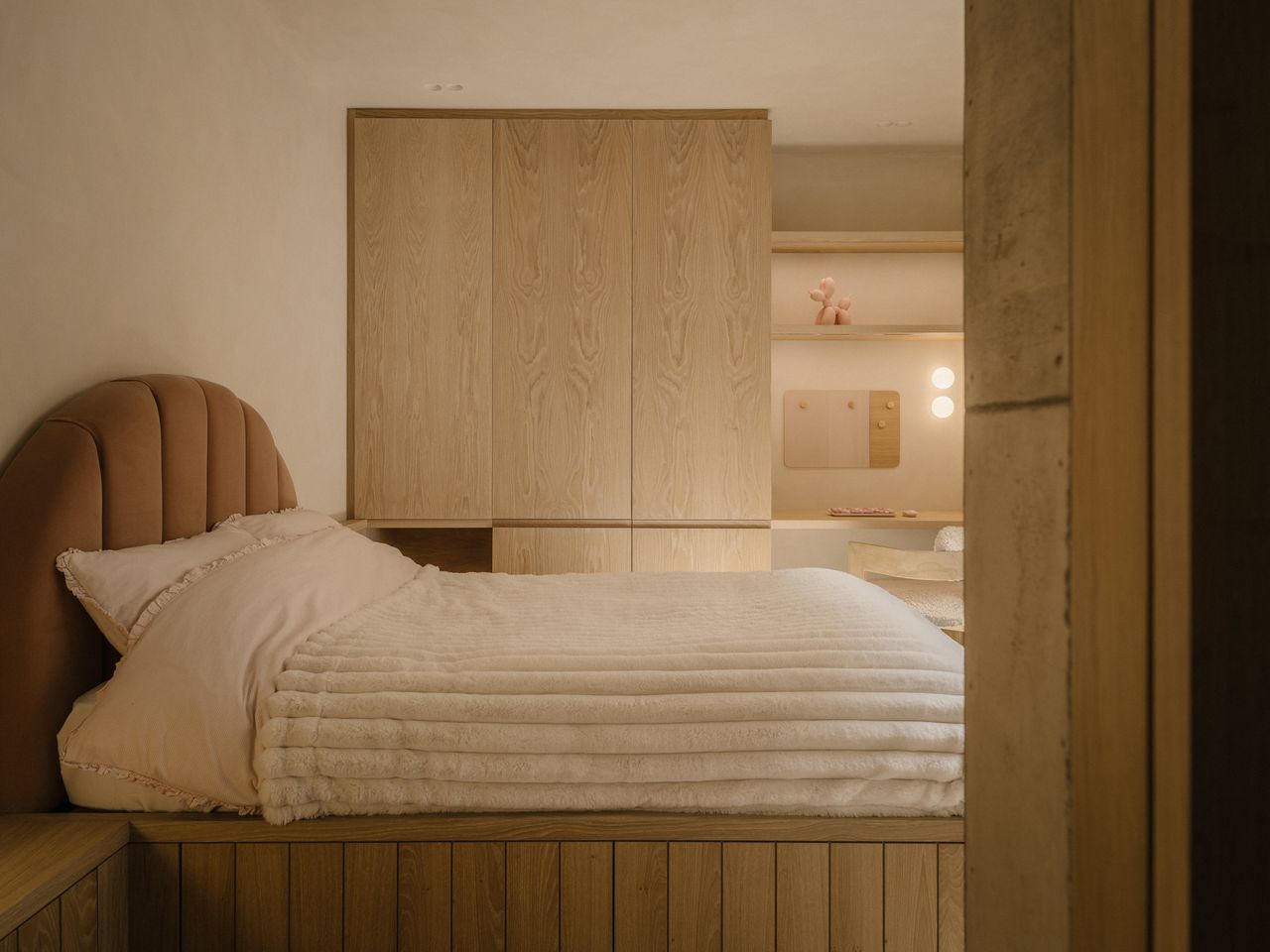 Two of the bedrooms in Green Lodge, each showing the built-in furniture