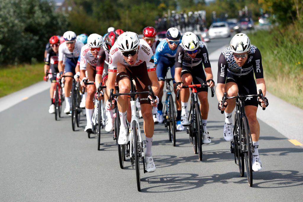 DOKKUM NETHERLANDS AUGUST 30 LR Michael Schr of Switzerland and AG2R Citren Team and Norman Hansen Lasse of Denmark and Team Qhubeka Nexthash compete during the 17th Benelux Tour 2021 Stage 1 a 1696km stage from Surhuisterveen to Dokkum BeneluxTour on August 30 2021 in Dokkum Netherlands Photo by Bas CzerwinskiGetty Images
