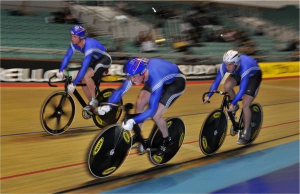 Matt Crampton takes up the race from Peter Mitchell as the team from the North West race to second fastest. David Daniel is the rider behind Crampton