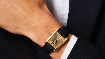 Cartier watch on man's wrist