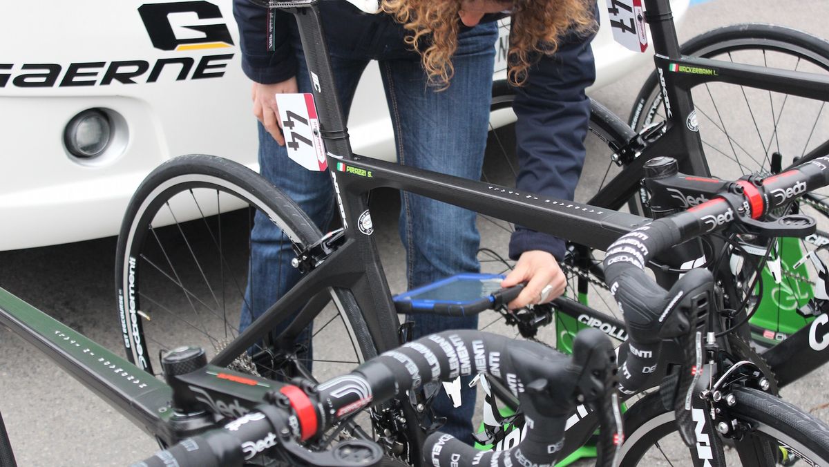 The UCI doing their usual motor doping checks ahead of the race