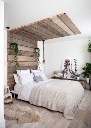 Bedroom with wooden canopy
