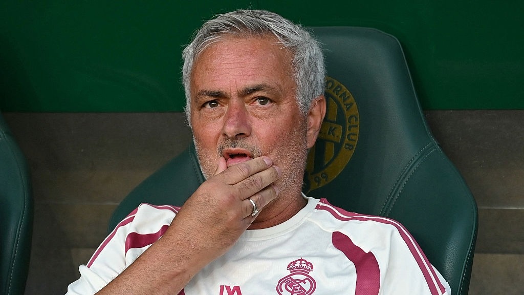Jose Mourinho, wearing a Real Madrid training top, scratches his chin before the start of the new La Liga 2026/27 season