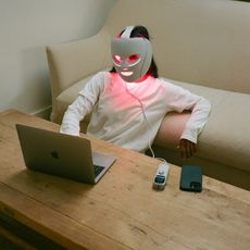 Photo of @monikh wearing a red light mask