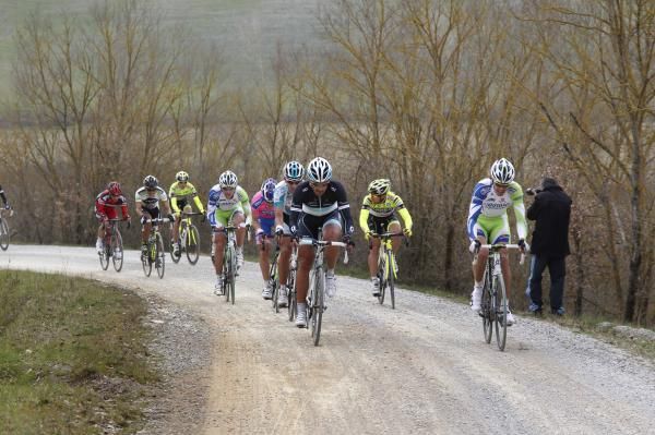 Fabian Cancellara (Leopard Trek) shows Daniel Oss (Liquigas-Cannondale) how it's done.