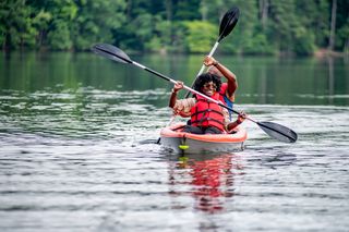 Friends having fun on a road trip, shot at Lake Johnson, Raleigh, North Carolina