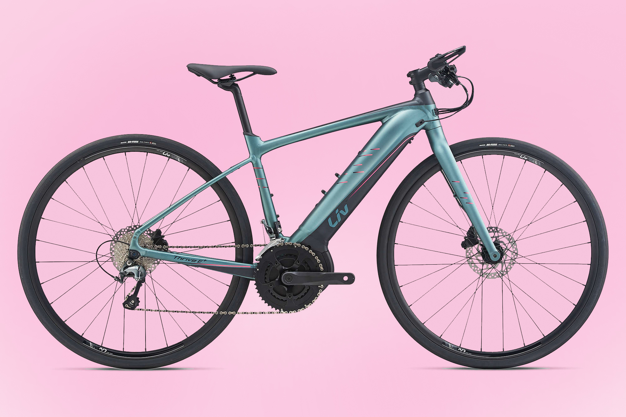 Liv Thrive E+2 Women's Specific hybrid e-bike on a pink background