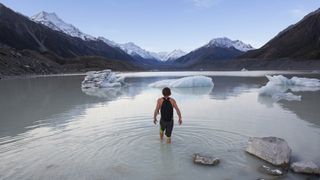 winter wild swimming: man in icy lake