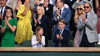 Catherine, Princess of Wales, Princess Charlotte of Wales, Prince George of Wales and Prince William, Prince of Wales, are seen in the Royal Box at Wimbledon 2023