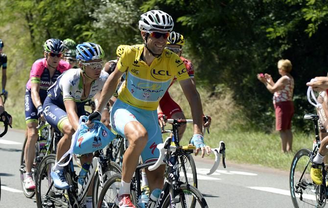 Race leader Vincenzo NIbali (Astana) takes food from the feed zone