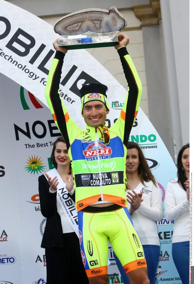 Simone Ponzi with the winner award