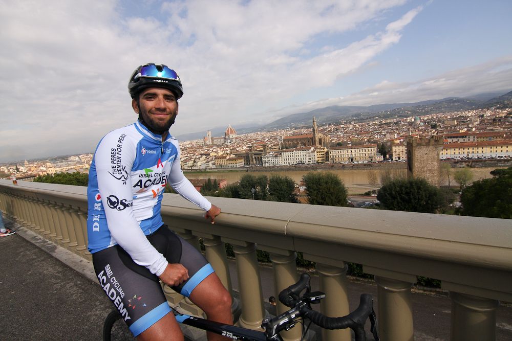 Aviv Yechezkel waits in Piazza Michelangelo to start the Gino Bartali ride