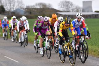 DENAIN FRANCE MARCH 17 LR Primoz Roglic of Slovenia and Team Jumbo Visma and Samuel Watson of United Kingdom and Team Groupama FDJ compete during the 63rd Grand Prix De Denain Porte du Hainaut 2022 a 2003km one day race from Denain to Denain GPDenain on March 17 2022 in Denain France Photo by Luc ClaessenGetty Images