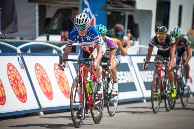 National Champion Allison Powers, NOW, hits the front of the field to animate the race action.