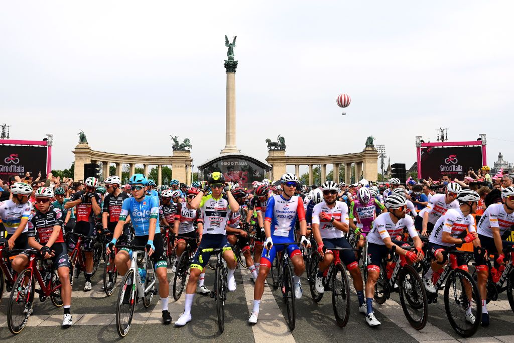 VISEGRAD HUNGARY MAY 06 LR Erik Fetter of Hungary and EoloKometa Cycling Team Barnabas Pek of Hungary and Team Intermarch Wanty Gobert Matriaux Attila Valter of Hungary and Team Groupama FDJ and The Peloton prior to the 105th Giro dItalia 2022 Stage 1 a 195km stage from Budapest to Visegrd 337m Giro WorldTour on May 06 2022 in Visegrad Hungary Photo by Tim de WaeleGetty Images