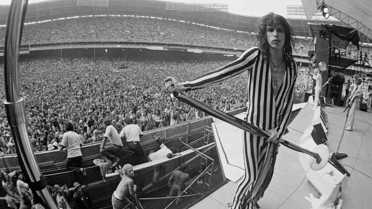 Aerosmith posing for a photograph in the mid-70s