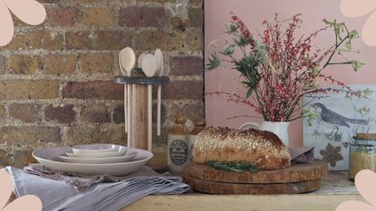 rustic kitchen with wooden butchers block and traditional wooden spoons to highlight a guide on how to clean wooden spoons