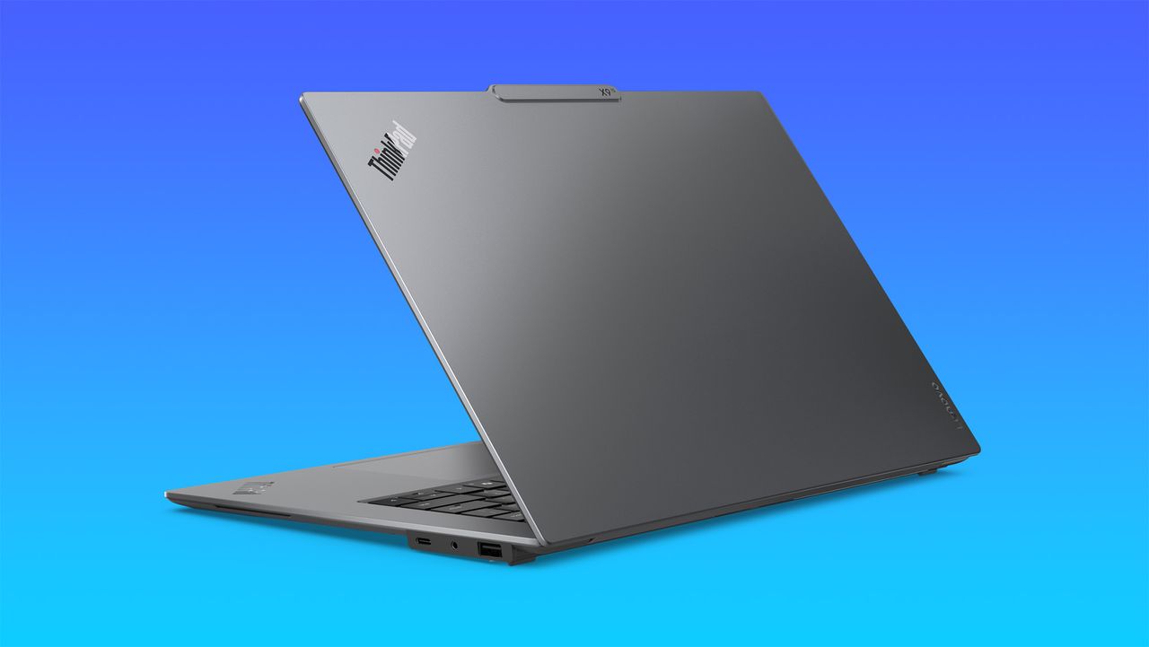 Lenovo ThinkPad X9 15 Aura Edition on a light blue to dark blue gradient background.