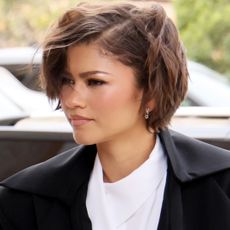 Zendaya wore a black-and-white off-duty outfit with platform The Row flip flops