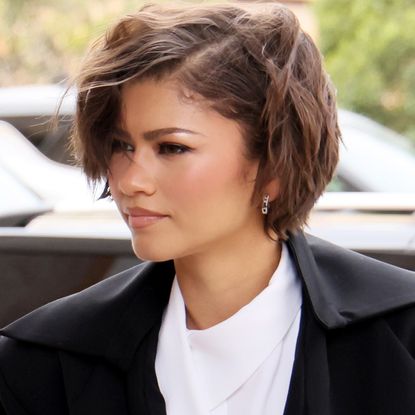 Zendaya wore a black-and-white off-duty outfit with platform The Row flip flops