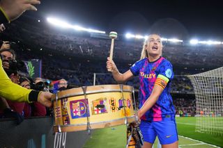 Alexia Putellas of FC Barcelona celebrates victory with fans following the UEFA Women's Champions League Quarter Final Second Leg match between FC Barcelona and Real Madrid at Camp Nou on March 30, 2022 in Barcelona, Spain.