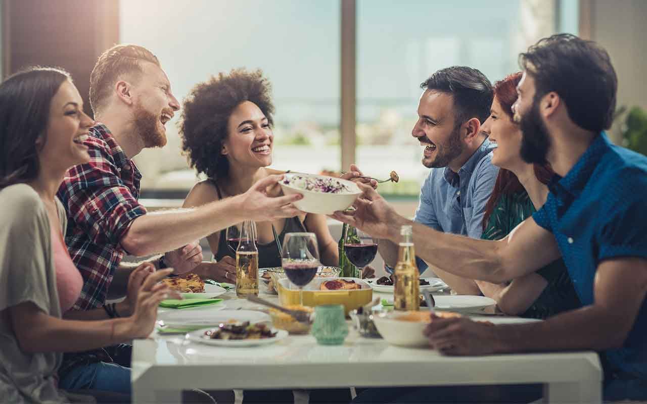 photo of 30-somethings at table