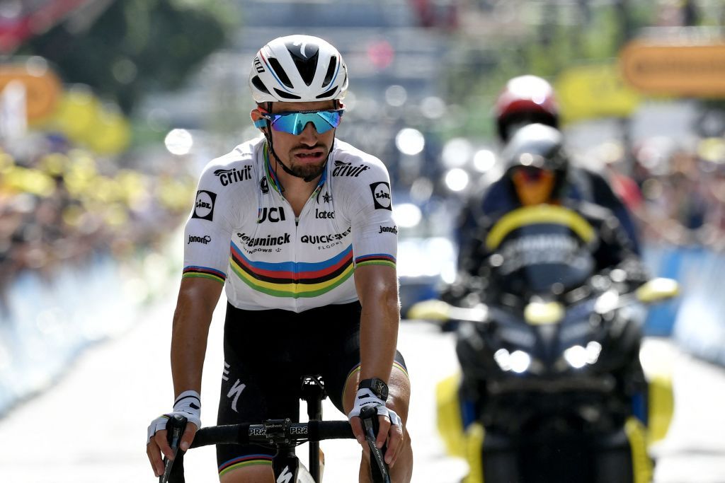 Team Deceuninck Quicksteps Julian Alaphilippe of France crosses the finish line of the 15th stage of the 108th edition of the Tour de France cycling race 191 km between Ceret and AndorreLaVieille on July 11 2021 Photo by Philippe LOPEZ AFP Photo by PHILIPPE LOPEZAFP via Getty Images