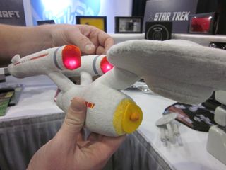Think Geek's plush Enterprise from Star Trek even lights up!