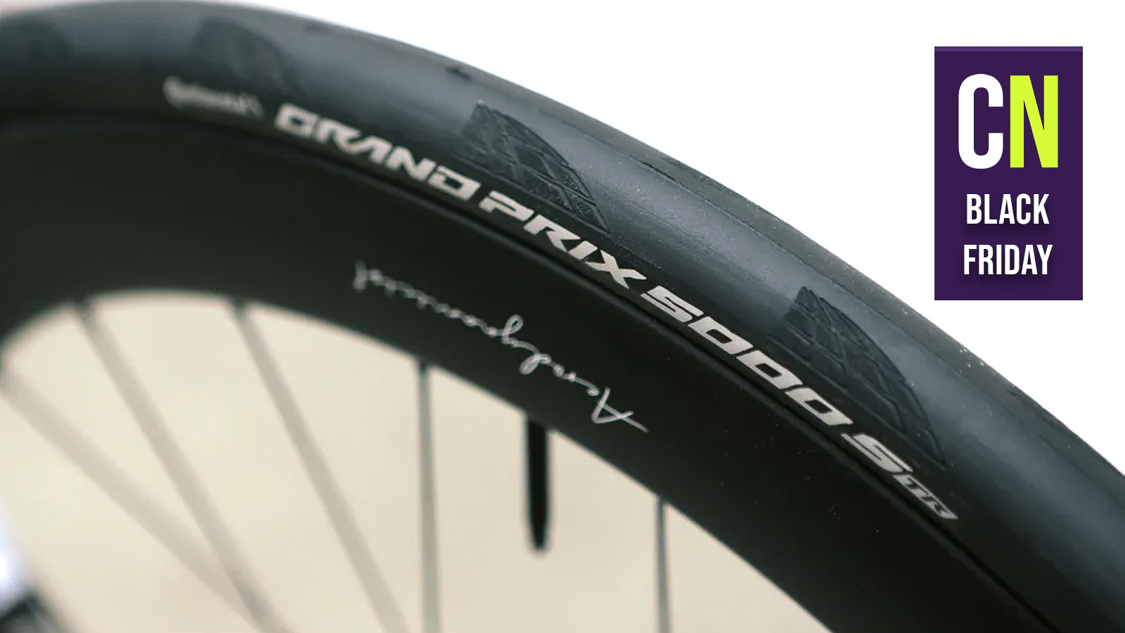 A Continental GP5000S TR mounted on a Hunt wheel with the Cyclingnews Black Friday 2025 logo