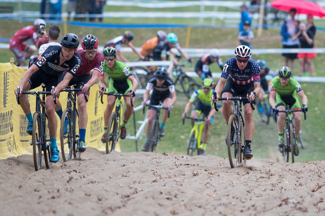 Summerhill takes the fast line with Powers attempting to pass in the loose sand in the center.