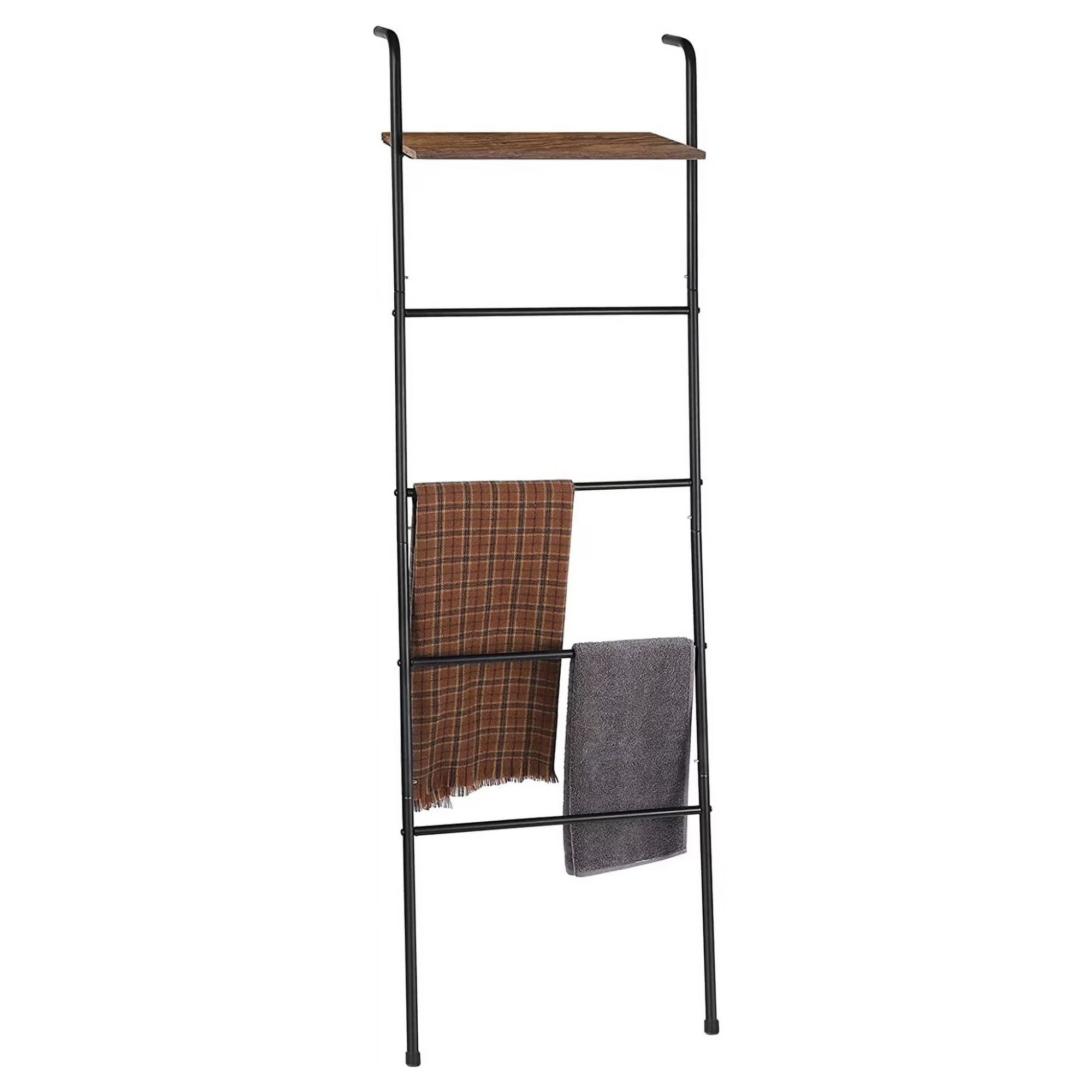 a decorative ladder holding blankets