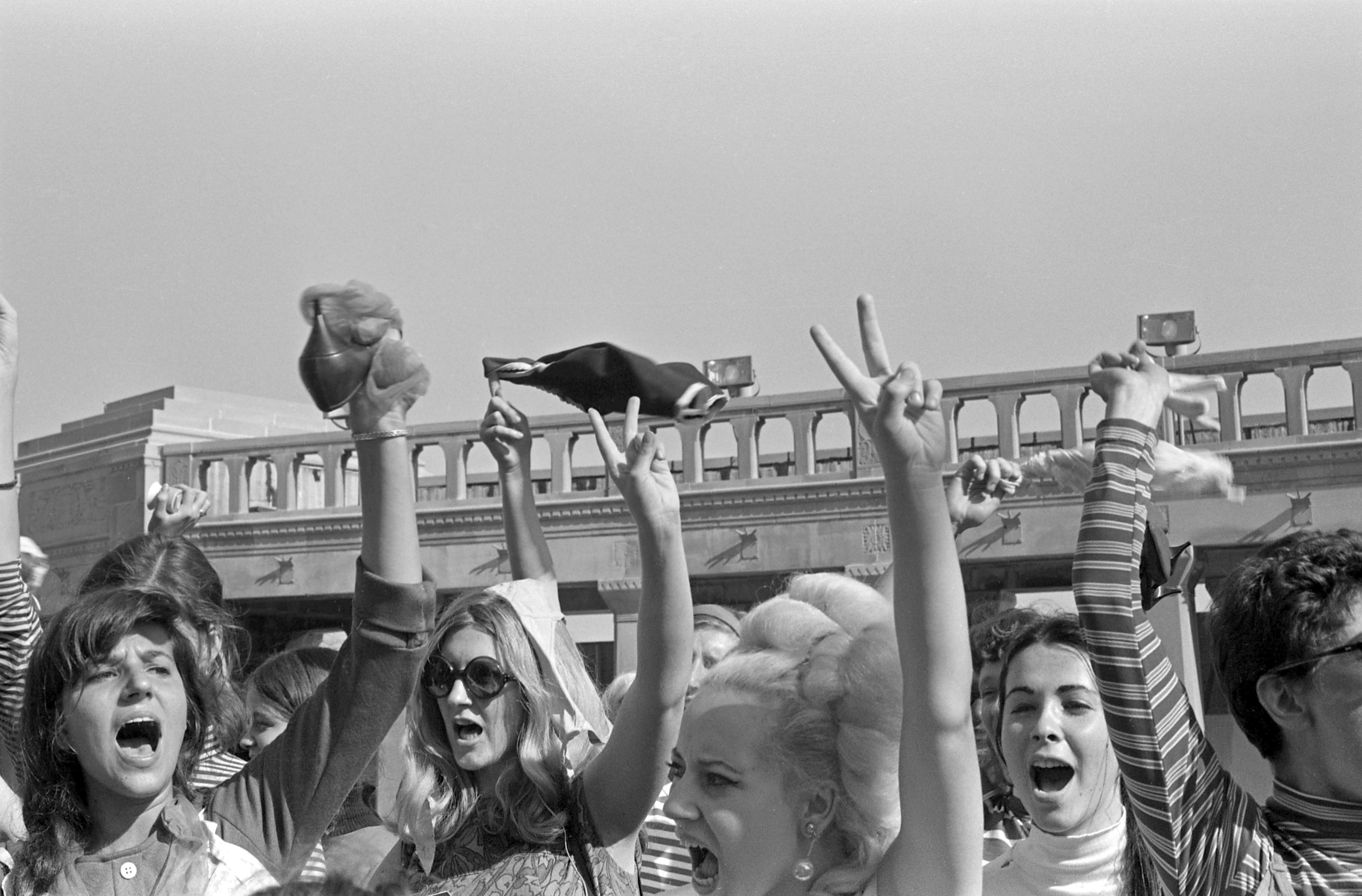 On the Atlantic City Boardwalk, demonstrators, some waving high heels or underwear, protest the Miss America beauty pageant, Atlantic City, New Jersey, September 7, 1968. The protest, organized by the New York Radical Women group, was known as &amp;amp;apos;No More Miss America,&amp;amp;apos; after a pamphlet written and distributed by the group. (Photo by Bev Grant/Getty Images)