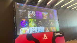 Adobe Photoshop on a big screen showing off new features