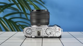 A Fujifilm X-M5 mirrorless vlogging camera in the silver colorway